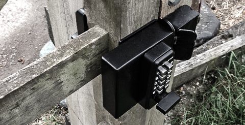 keyless combination lock for wooden gate with mechanical keypad on both sides.