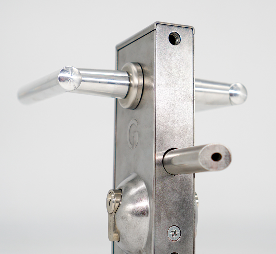 Stainless steel lock with latch bolt and deadlock in same bolt.