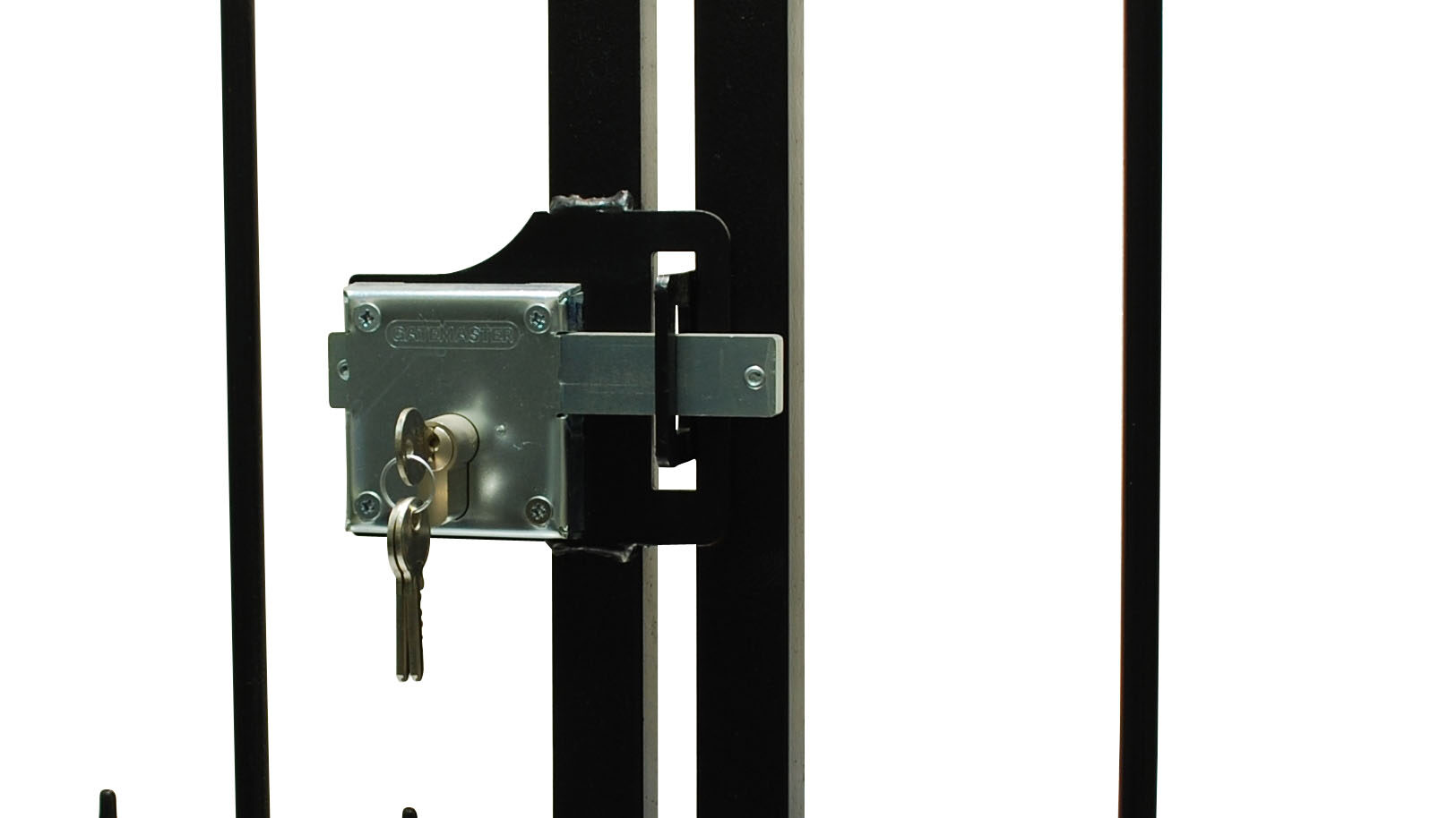gate locking bolt installed on metal gate with ornamental scrolls.