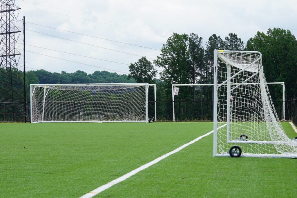 secure your football pitches with fencing and locks for sports facilities