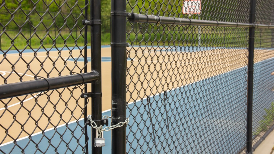 sports court with chain link fence